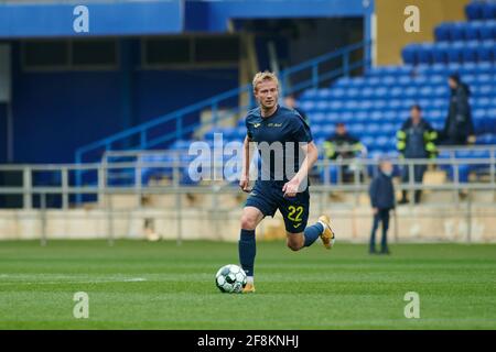 KHARKIV, UKRAINE - APRIL 14, 2021: The football match of Professional football league. FC Metal Kharkiv vs FC Peremoha Stock Photo