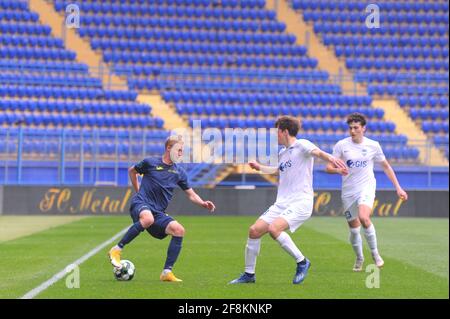 KHARKIV, UKRAINE - APRIL 14, 2021: The football match of Professional football league. FC Metal Kharkiv vs FC Peremoha Stock Photo