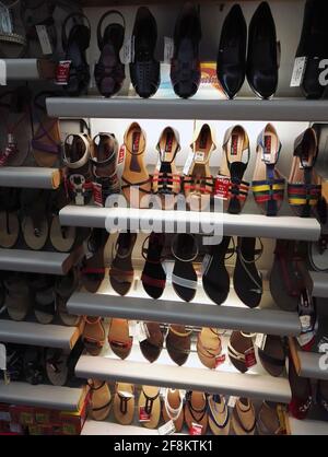 Bangalore, India - October 08, 2017: Traditional shoes footwears or Juttis of various designs on display made from leather and decorated with various Stock Photo