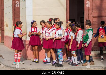 TRINIDAD, CUBA - FEB 8, 2016: Group of Young Pioneer girls in Trinidad, Cuba Stock Photo