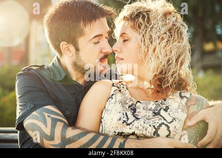 closeup portrait of happy kissing couple in love. loving embracing man and woman. Stock Photo