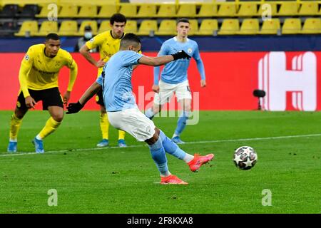 Dortmund, Germany. 14th Apr, 2021. Football: Champions League, knockout round, quarter-finals, second leg, Borussia Dortmund - Manchester City at Signal Iduna Park. Manchester City's Riyad Mahrez scores from the penalty spot to make it 1:1. Credit: Martin Meissner/AP-Pool/dpa/Alamy Live News Stock Photo