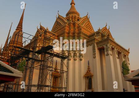 Low angle view from Phra Mondop or ho trai at Wat Pho is the small libary hall for Buddhist scritures, located at Phra Chedi Rai, Bangkok, Thailand. Stock Photo