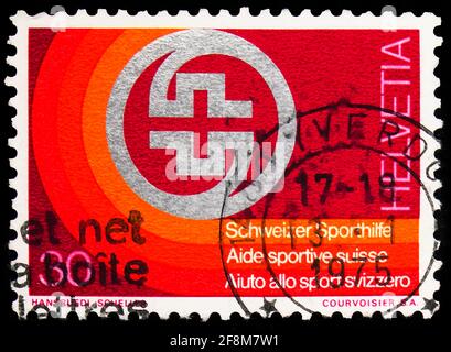 MOSCOW, RUSSIA - SEPTEMBER 30, 2019: Postage stamp printed in Switzerland shows Badge of Swiss Sport Aid, serie, circa 1974 Stock Photo