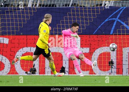 DORTMUND, GERMANY - APRIL 14: Erling Haaland of Borussia Dortmund and Ederson of Manchester City during the UEFA Champions League Quarter Final 1: Leg Stock Photo