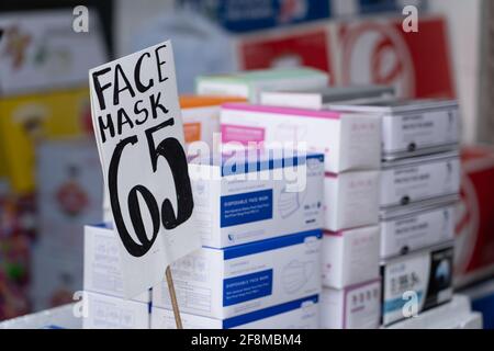 A sign advertising face masks for sale in Cebu City, Philippines Stock Photo