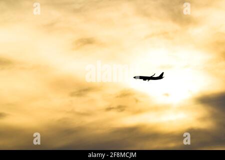 Flying into the sunset Stock Photo