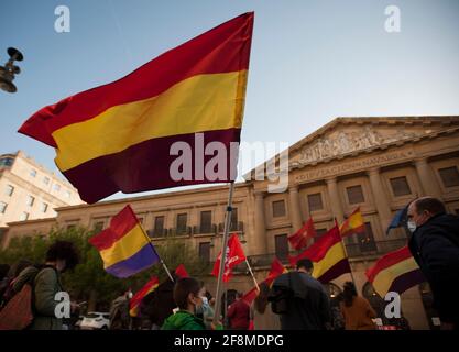 Pamplona, Spain. 14th Apr, 2021. Several protesters waving republican flags and flags of the Communist Party during the 90th anniversary celebration of the second republic in Spain, in front of the Palacio de Navarra.50 protesters demanded labour equality, the abolition of the monarchy and fair wages for all citizens, thus working to establish the Third Republic during the anniversary. (Photo by Elsa A Bravo/SOPA Images/Sipa USA) Credit: Sipa USA/Alamy Live News Stock Photo