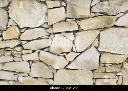 Old limestone material Seamless brick wall background Stock Photo