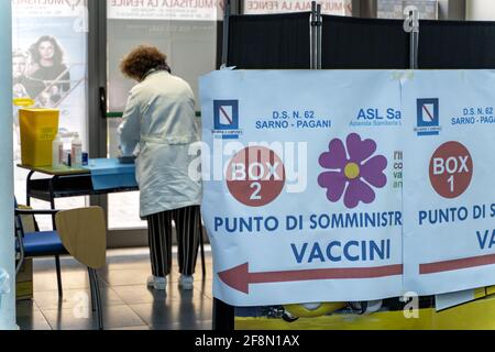 Pagani, Italy. 13th Apr, 2021. PAGANI, ITALY - APRIL 13: The vaccination point, set up in the foyer of the paganese cinema, is equipped with reception and registration areas, a counter with four computer stations for the history of vaccinations, a sorting point, four vaccination boxes and a post-vaccine observation room, and all the spaces necessary for staff and medical-health equipment. (Photo by Alessandro Barone/Pacific Press) Credit: Pacific Press Media Production Corp./Alamy Live News Stock Photo
