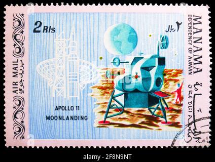 MOSCOW, RUSSIA - SEPTEMBER 30, 2019: Postage stamp printed in Manama shows Moonlanding, First Manned Moon Landing - Apollo 11 serie, circa 1969 Stock Photo
