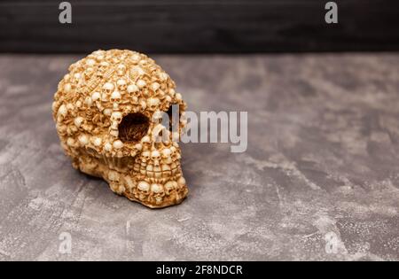 Human scary skull on black background. Halloween mystic concept Stock Photo
