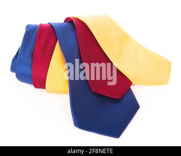 Red silk business tie rolled up over white background. Stock Photo
