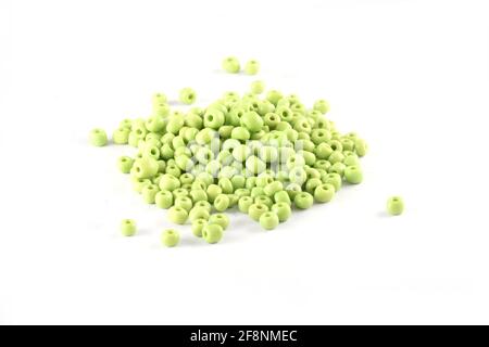 Beads spread on white background Background Close up, macro, make bead necklace or Bead Crochet Daily Beading Stock Photo