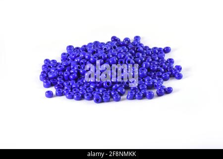 Beads spread on white background Background Close up, macro, make bead necklace or Bead Crochet Daily Beading Stock Photo