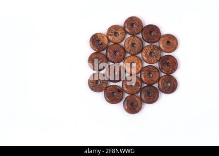 Wooden beads on white background Top view Stock Photo