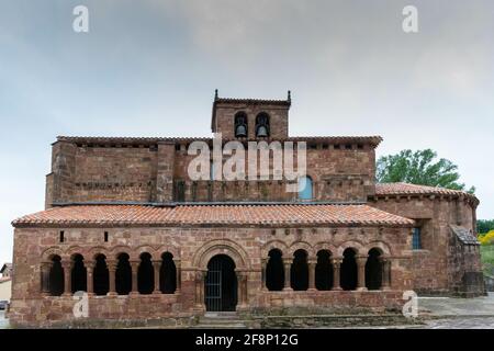 Romanesque Church of San Esteban Protomartir under a cloudy sky in Spain Stock Photo