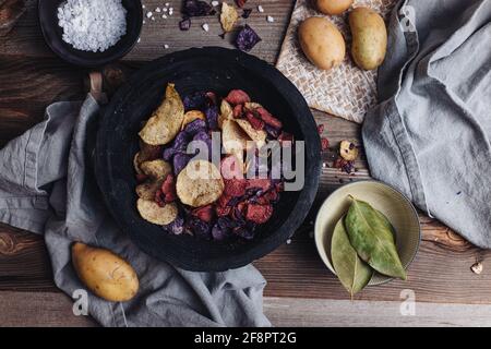 Crispy potato chips in various colors Stock Photo