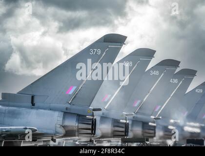 RAF Coningsby Modern Typhoon Eurofighter military combat jet fighters aircraft stationary five in a row with engines running heat blur symmetrical row Stock Photo