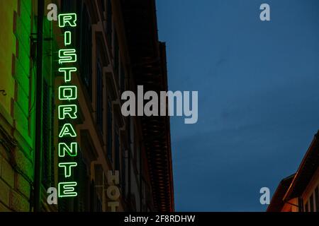 Green Neon Ristorante Sign in Florence, Italy. Stock Photo