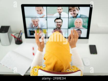 Middle Eastern businesswoman having the online conference Stock Photo
