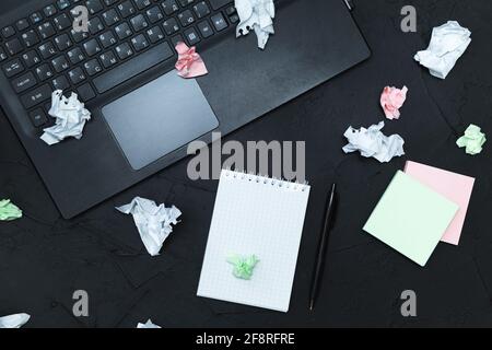 Business accessories on graphite background. Business, distance work, self-study concept. Top view, flat lay, low key. Stock Photo