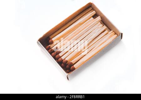 Open matches box isolated on a white background. Close-up of open matchbox Stock Photo