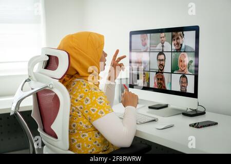 Middle Eastern businesswoman having the online conference Stock Photo