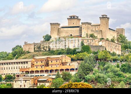 Distant view at the old town of Spoleto, Umbria, Italy and the Rocca Albornoziana Stock Photo