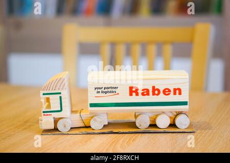 POZNAN, POLAND - Apr 01, 2016: Wooden Raben company truck with trailer miniaure model Stock Photo