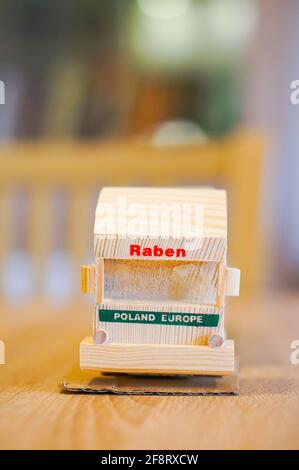 POZNAN, POLAND - Apr 01, 2016: Wooden Raben company truck with trailer miniaure model Stock Photo