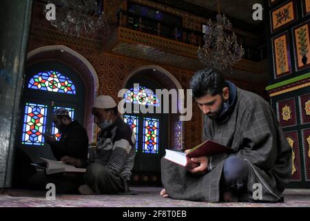 April 14, 2021: Kashmiri muslims read Holy Quran on the first day of ...
