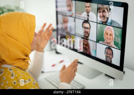 Middle Eastern businesswoman having the online conference Stock Photo