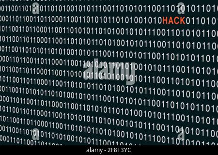 Word HACK in binary code/cybersecurity concept Stock Photo