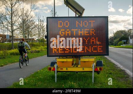 Taplow, Buckinghamshire, UK. 15th April, 2021. Following the sad passing of Prince Philip, a private funeral will be held at St George's Chapel in the grounds of Windsor Castle on Saturday 17th April 2021. Given the Covid-19 restrictions, a large LED sign on the A4 tells locals not to gather at Royal residences, however, it is expected that many people will still go into Windsor on Saturday. Credit: Maureen McLean/Alamy Live News Stock Photo