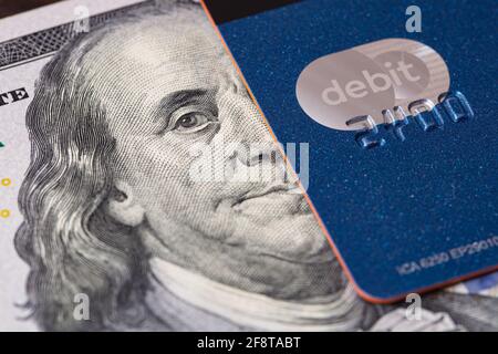 Debit card and US 100 dollar banknote for design purpose Stock Photo