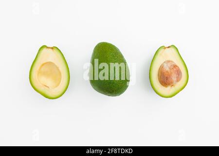 Set of avocado fruit. Fresh whole and half avocado isolated on white ...