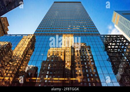 Zero Halliburton building, 300 Madison Ave, New York, NY 10017  Office buildings reflected in the windows of other office buildings. Stock Photo