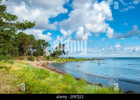 White lighthouse on the picturesque shore of the Baltic sea in Vergi village. Lahemaa natural park, Estonia Stock Photo