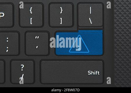 Icon of exclamation mark on keyboard key. Concept of danger and warning Stock Photo