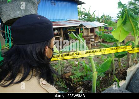 Makassar, Indonesia. 15th Apr, 2021. Police installed a police line at the scene of the shooting of the suspected terrorist in Makassar, which resulted in the death of the perpetrator. The perpetrator was a terrorist network associated with the Cathedral bombing in Makassar City. (Photo by Eric Dubost/Pacific Press/Sipa USA) Credit: Sipa USA/Alamy Live News Stock Photo