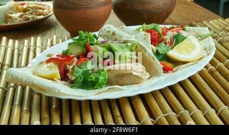 Tinga de Pollo - Slow-Cooker Chicken Tinga, Mexican stew of chicken, tomato, onion, and chipotle peppers. Stock Photo