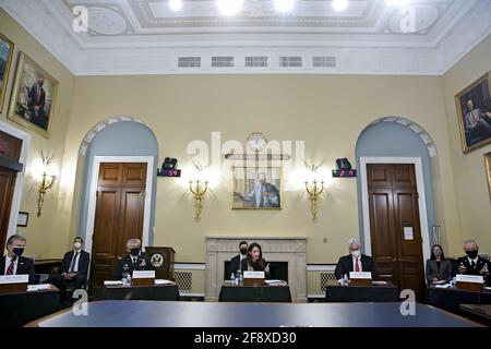 Christopher Wray, director of the Federal Bureau of Investigation (FBI), from left, Paul Nakasone, director of the National Security Agency (NSA) and commander of the U.S. Cyber Command, Avril Haines, director of national intelligence, William Burns, director of the Central Intelligence Agency (CIA), and Scott Berrier, director of the Defense Intelligence Agency, testify during a House Intelligence Committee hearing in Washington, DC, U.S., on Thursday, April 15, 2021. The hearing follows the release of an unclassified report by the intelligence community detailing the U.S. and its allies wi Stock Photo