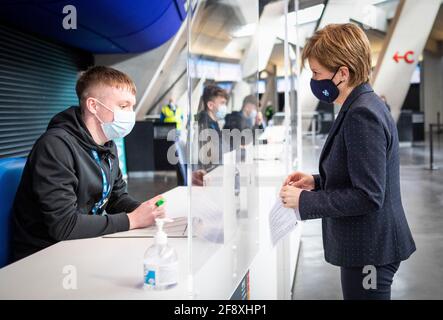 First Minister of Scotland Nicola Sturgeon arrives to get her first shot of the Astra Zeneca at the NHS Louisa Jordan vaccine centre in the SSE Hydro in Glasgow, Scotland. Picture date: Thursday April 15, 2021. Stock Photo
