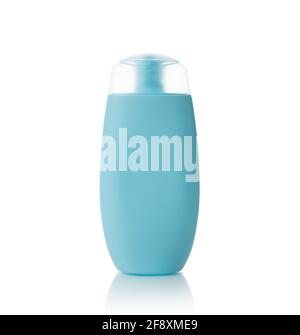 Blue plastic bottle with flip top lid for shampoo, conditioner or shower gel isolated on white. Unlabeled cosmetic container for body care and beauty. Stock Photo