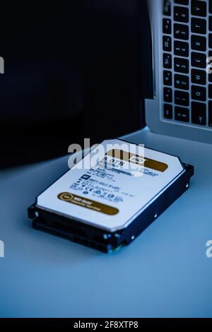 ide view of new Western Digital 8TB terabyte datacenter gold hard disk Stock Photo