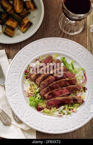 Fillet of beef with mixed salad. High quality photo. Stock Photo