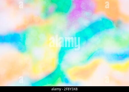 Colorful bokeh lights. Bright blurred rainbow colored background . Stock Photo