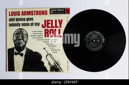 Disco, Jazz and blues artist Louis Armstrong music album on vinyl record LP disc. Titled: Ain't Gonna Give Nobody None Of My Jelly Roll Stock Photo