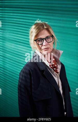 Cheerful mature woman looking at camera through hand finger heart Stock ...